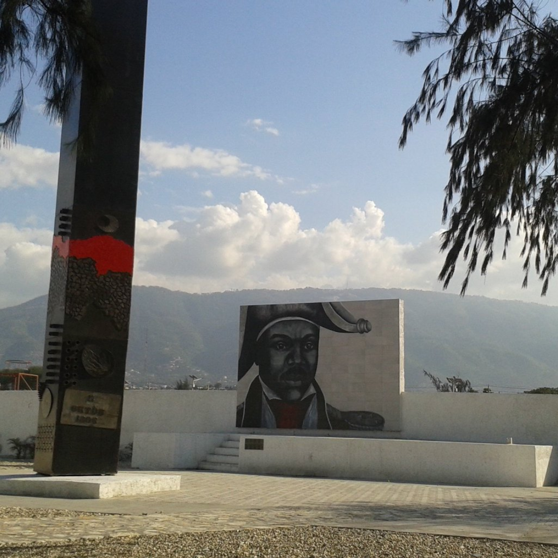 Dessalines Memorial document which features a portrait on a large wall. 