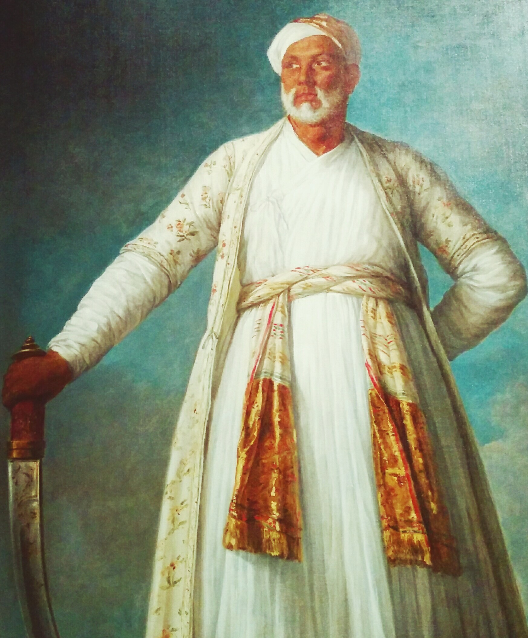 Painting of TIpu's ambassador to France, wearing white robes. 