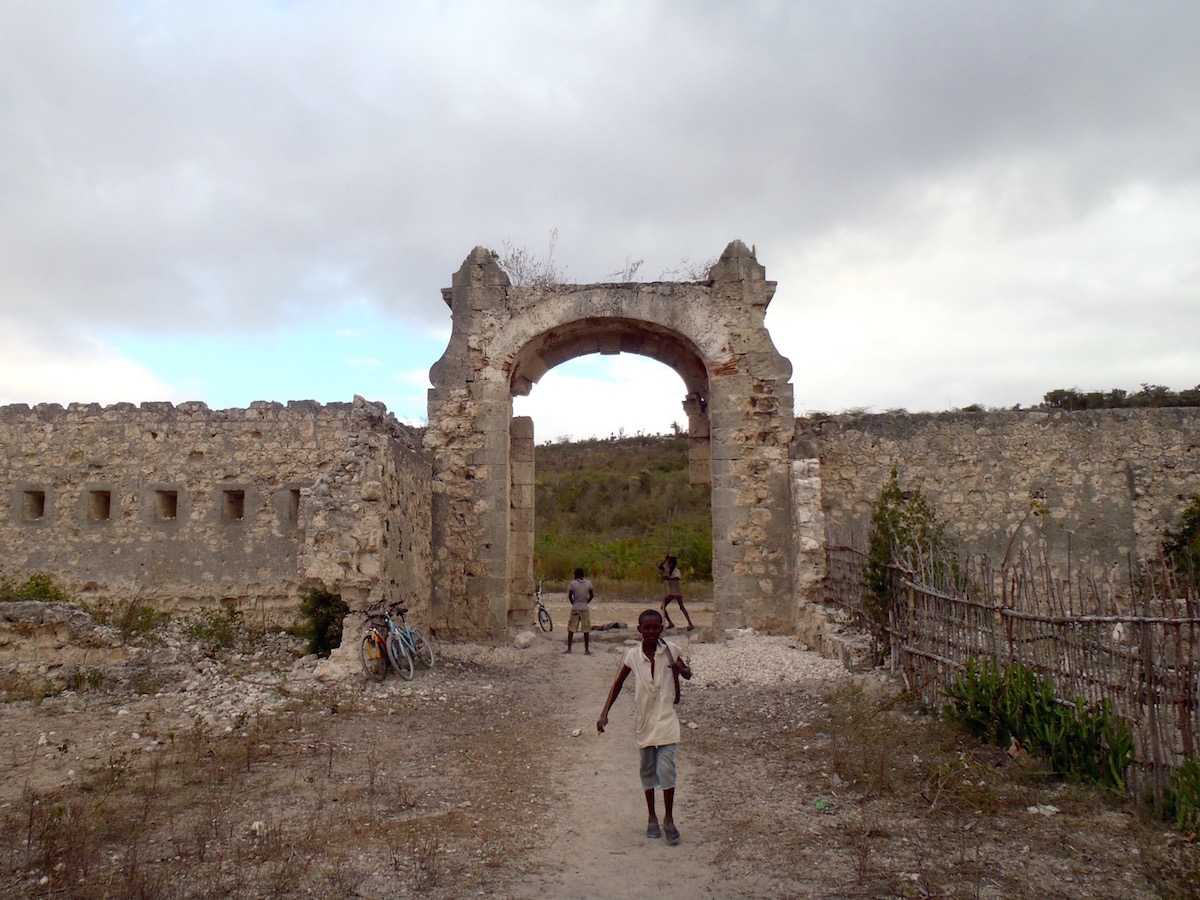 City walls and gate falling into ruin.