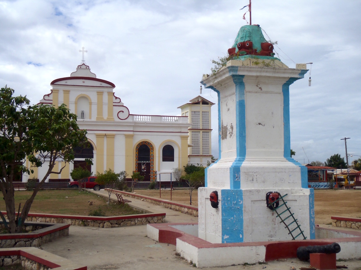 White and yellow cathedral building.