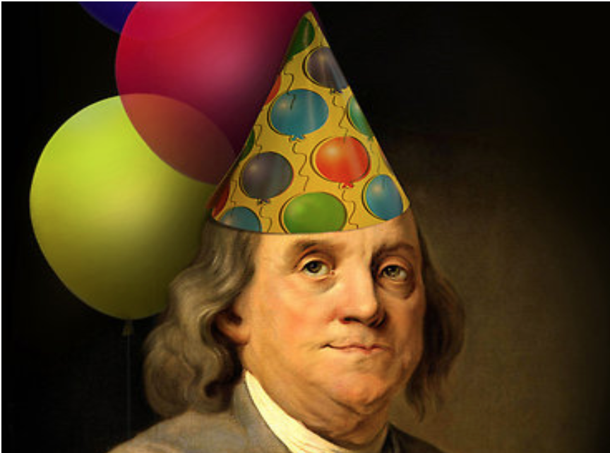 Portrait of Benjamin Franklin wearing a birthday hat and balloons. 