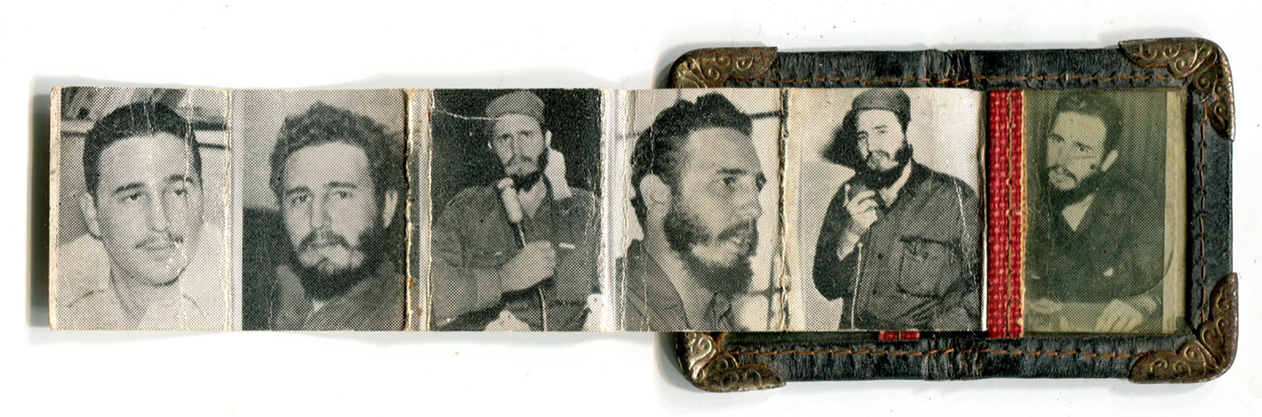 Accordion foldout keepsake with Castro portraits.