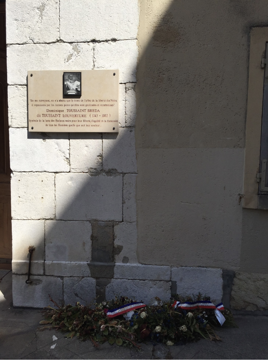 A commemorative plaque to Toussaint L'ouverture.