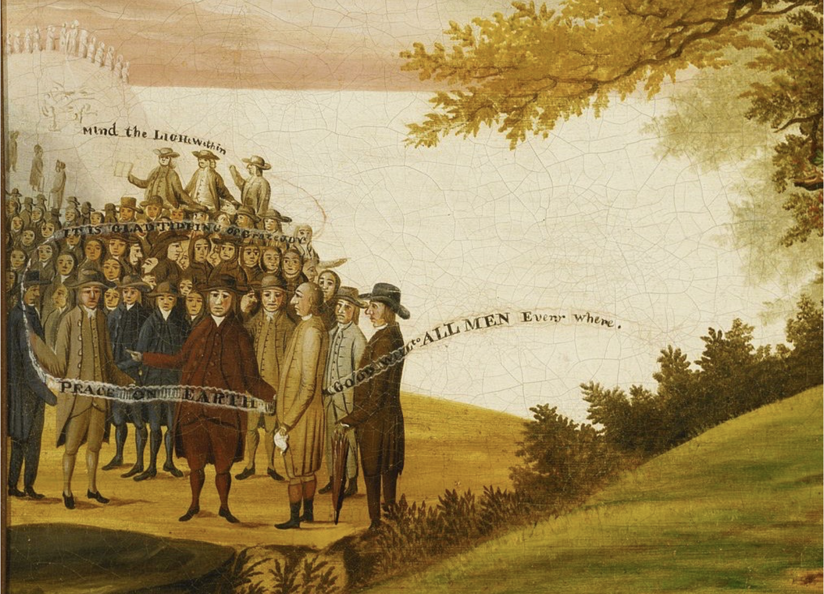 A group of Quakers waving banners.