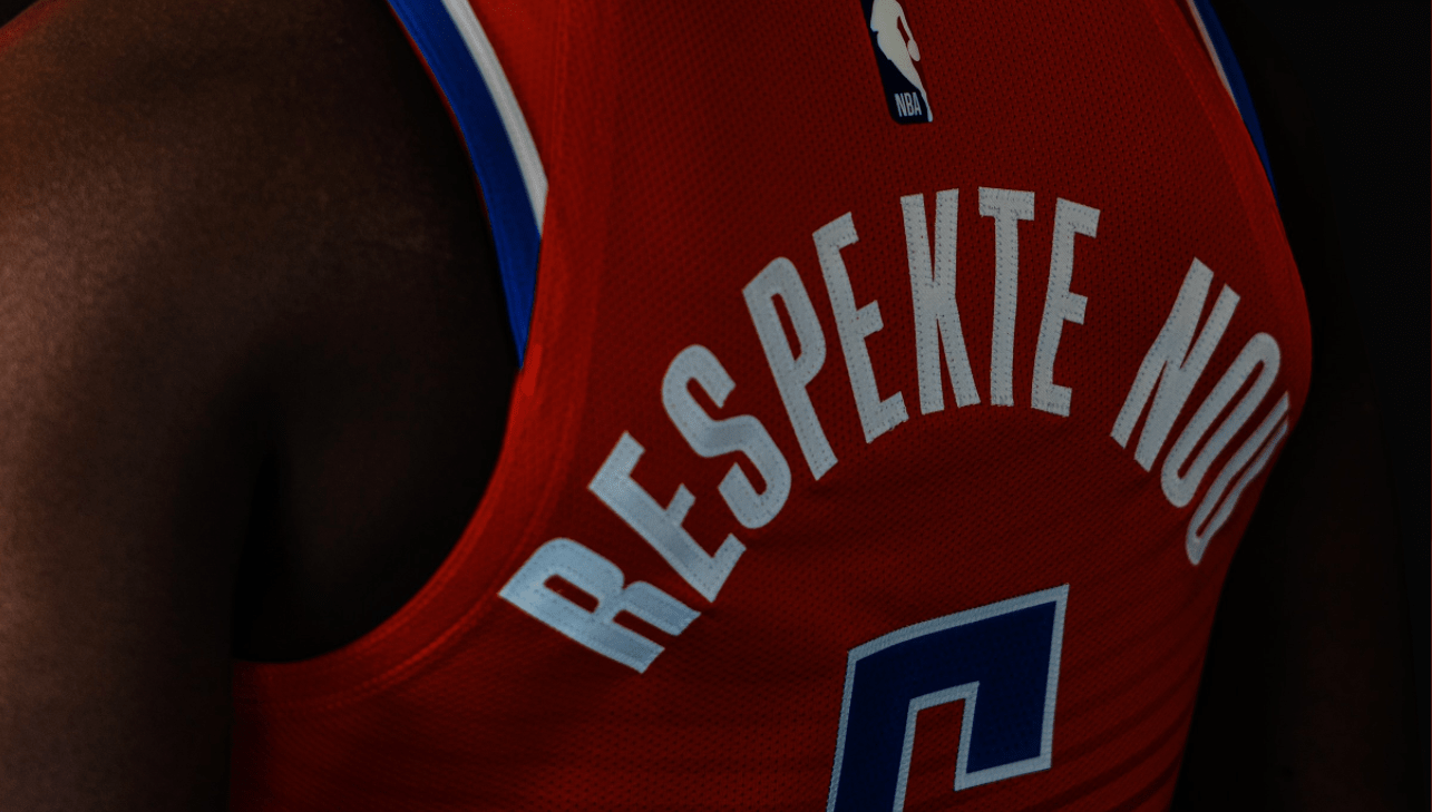 Basketball jersey which reads "Respetke Nou" in Haitian Creole.